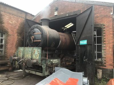 The boiler is pulled out of the workshop for the steam tests.